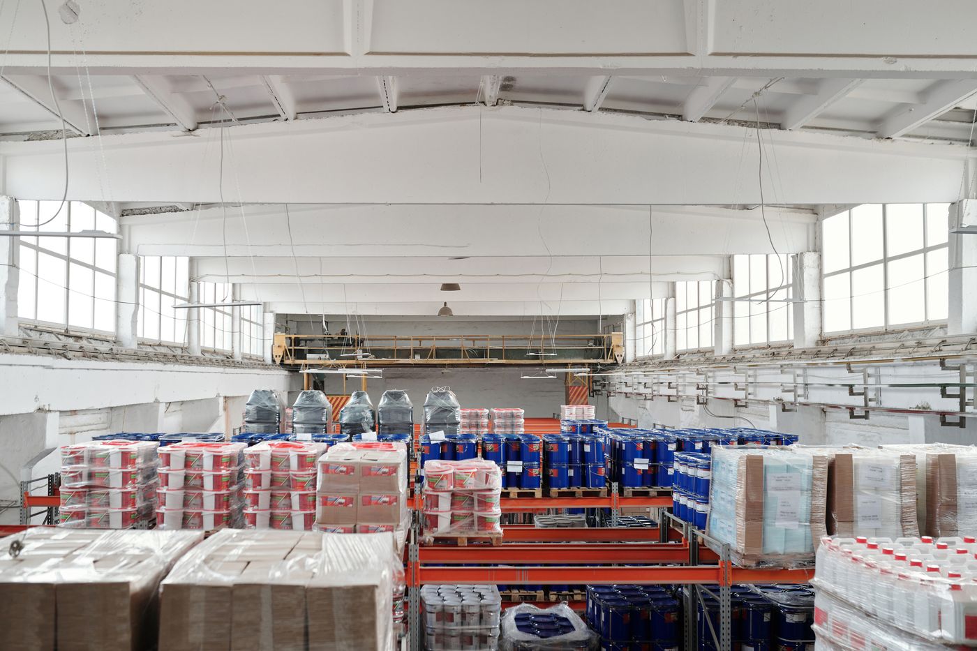 Warehouse aisles and stored inventory.